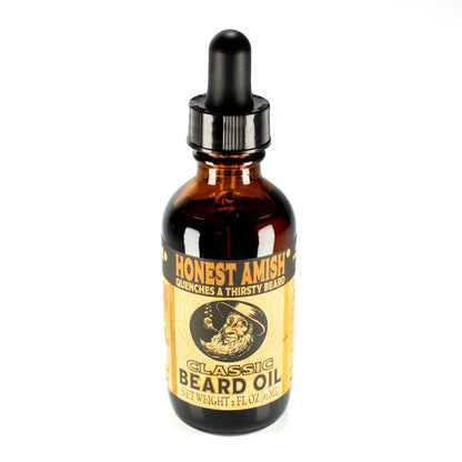 Conditioning beard oil being applied to facial hair for softness and shine